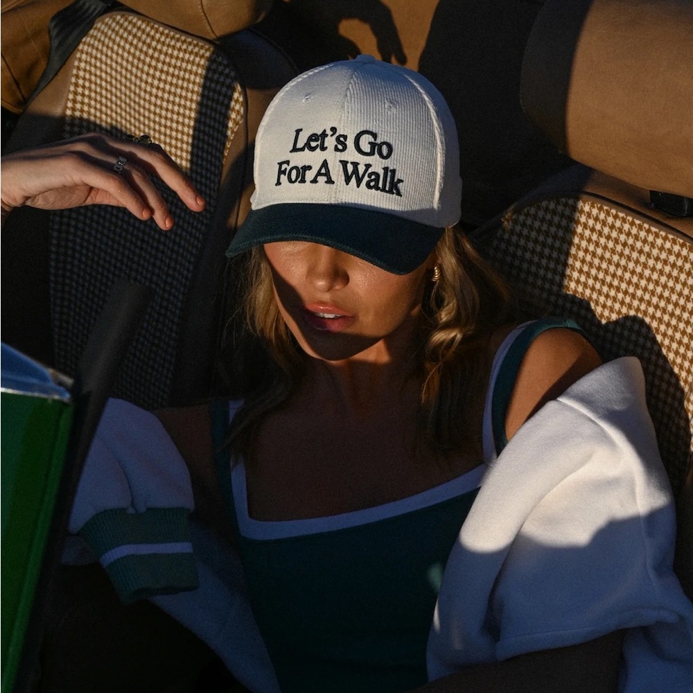 Yellow the label let’s go for a walk hat.